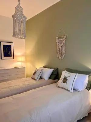 Letto o letti in una camera di Casa Lolò