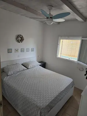 Letto o letti in una camera di Nereide