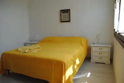 Letto o letti in una camera di Casa Amarilla Sacra Famiglia Padova