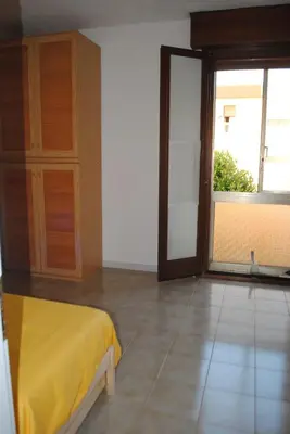 Letto o letti in una camera di Casa Amarilla Sacra Famiglia Padova