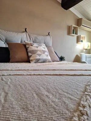Letto o letti in una camera di DGA oasi