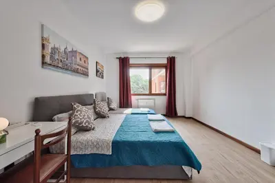Letto o letti in una camera di Bellavista Palladio Apartment