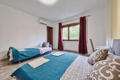 Letto o letti in una camera di Bellavista Palladio Apartment