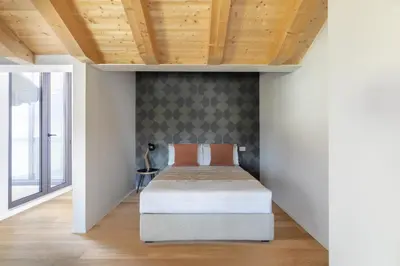 Letto o letti in una camera di Molino 6 by WelcHome