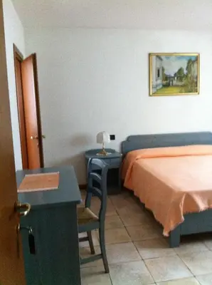 Letto o letti in una camera di RosArancio