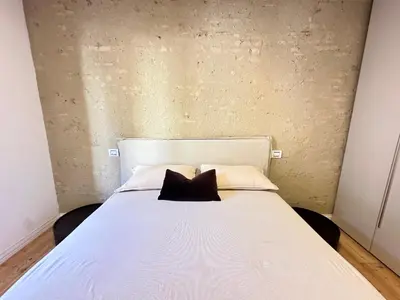 Letto o letti in una camera di La Corte B&B Conegliano