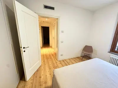 Letto o letti in una camera di La Corte B&B Conegliano
