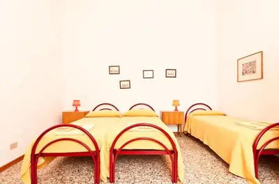 Letto o letti in una camera di Ca' Querini - Apartment