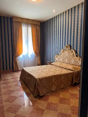 Letto o letti in una camera di Zulian V