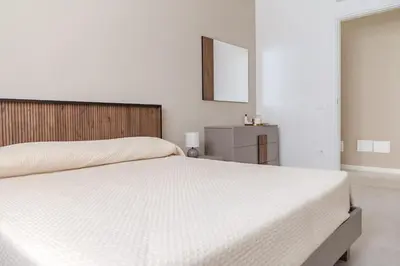 Letto o letti in una camera di MINA Apartments