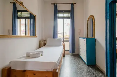 Letto o letti in una camera di GuestHost - Lido di Venezia - Two Aparments near the Beach