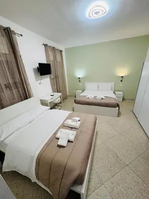 Letto o letti in una camera di MMM HOME Train Station 1
