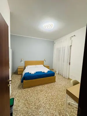 Letto o letti in una camera di MMM HOME Train Station 1