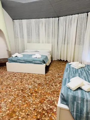 Letto o letti in una camera di MMM HOME Train Station 1