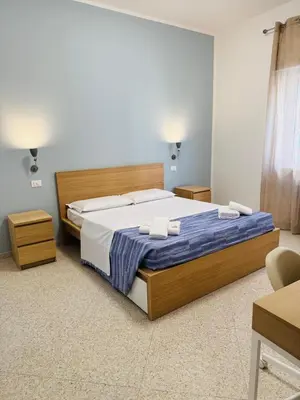 Letto o letti in una camera di MMM HOME Train Station 1