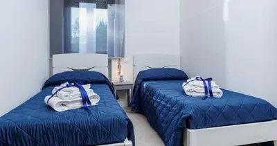 Letto o letti in una camera di A Casa di Nina