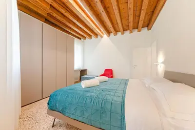 Letto o letti in una camera di San Tommaso Rialto Terrace Apt