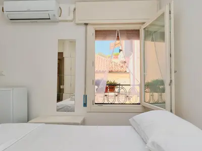 Letto o letti in una camera di Duomo Affascinante Monolocale