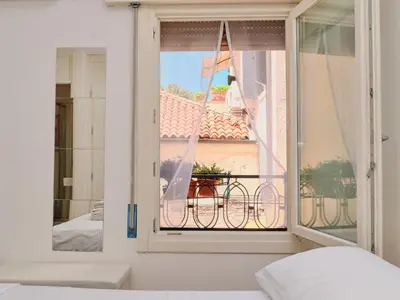 Letto o letti in una camera di Duomo Affascinante Monolocale