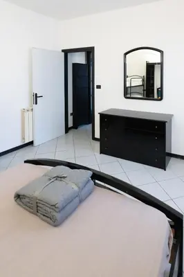Letto o letti in una camera di Casa Maria
