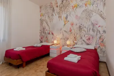Letto o letti in una camera di MarcoPoloAirport4-Parking-Wifi-Netflix-PrimeVideo