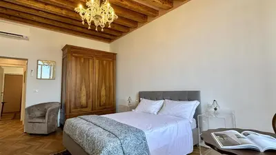 Letto o letti in una camera di Da Mosto Palace Prestige