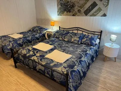 Letto o letti in una camera di Something else in Venice Kingsclass