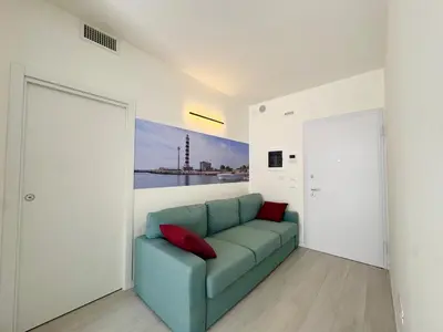 Area soggiorno di Brezza Marina - Home Immobiliare