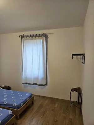 Letto o letti in una camera di Ca' San Valentino