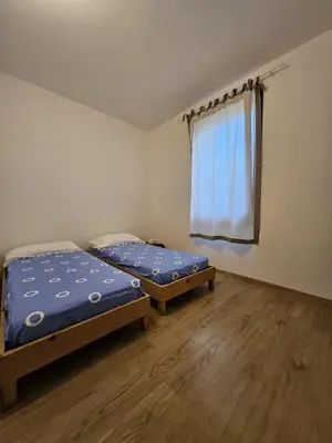 Letto o letti in una camera di Ca' San Valentino