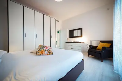 Letto o letti in una camera di Ohana