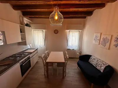 Cucina o angolo cottura di Appartamento Ravagnan 4 persone 1 camera da letto