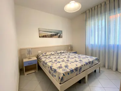 Letto o letti in una camera di Artesi - Carraro Immobiliare - Family Apartments