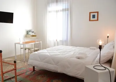Letto o letti in una camera di B&B Giardino Jappelli (Villa Ca' Minotto)