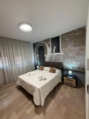 Letto o letti in una camera di Pieno centro