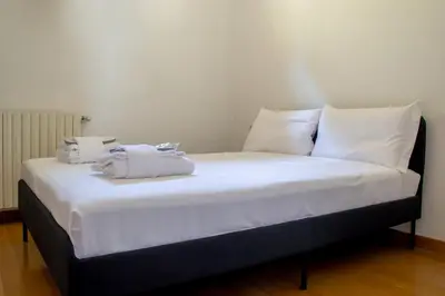 Letto o letti in una camera di Welc-ōM Marsala Apartment