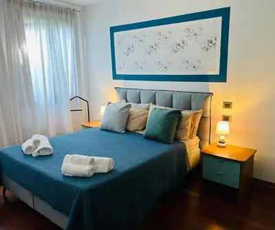 Letto o letti in una camera di Golf Holiday House - Appartamento con soggiorno e due camere da letto