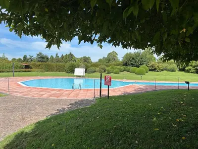 Piscina di Golf Holiday House - Appartamento con soggiorno e due camere da letto o nelle vicinanze