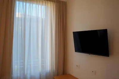 TV o dispositivi per l'intrattenimento presso Welc-ōM Tiepolo Cozy Stay Free Parking