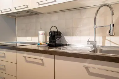 Cucina o angolo cottura di Welc-ōM Toti Station Flat