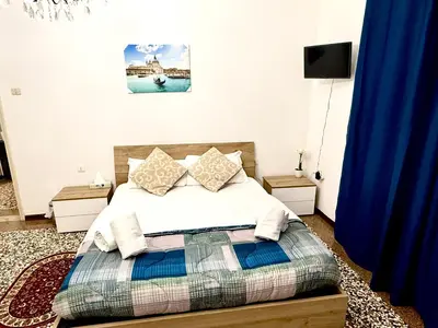 Letto o letti in una camera di Venice Mestre Train Station Apartment