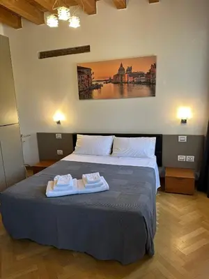 Letto o letti in una camera di Osteria Locanda Veneta