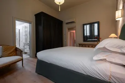 Letto o letti in una camera di Ca' Maddalena - Sole