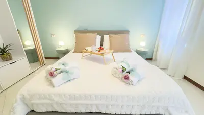 Letto o letti in una camera di Dimora Sotto le Stelle by Ca-Sa Check