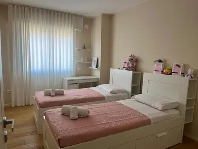 Letto o letti in una camera di Ilary Home