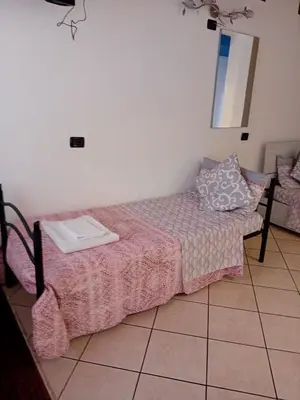 Letto o letti in una camera di Jolly Private Room