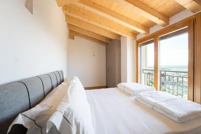 Letto o letti in una camera di IL Pollaio