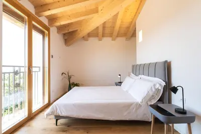 Letto o letti in una camera di IL Pollaio