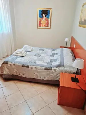 Letto o letti in una camera di Casa Colonna Montegrotto terme