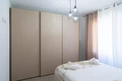 Letto o letti in una camera di Casa Sambò